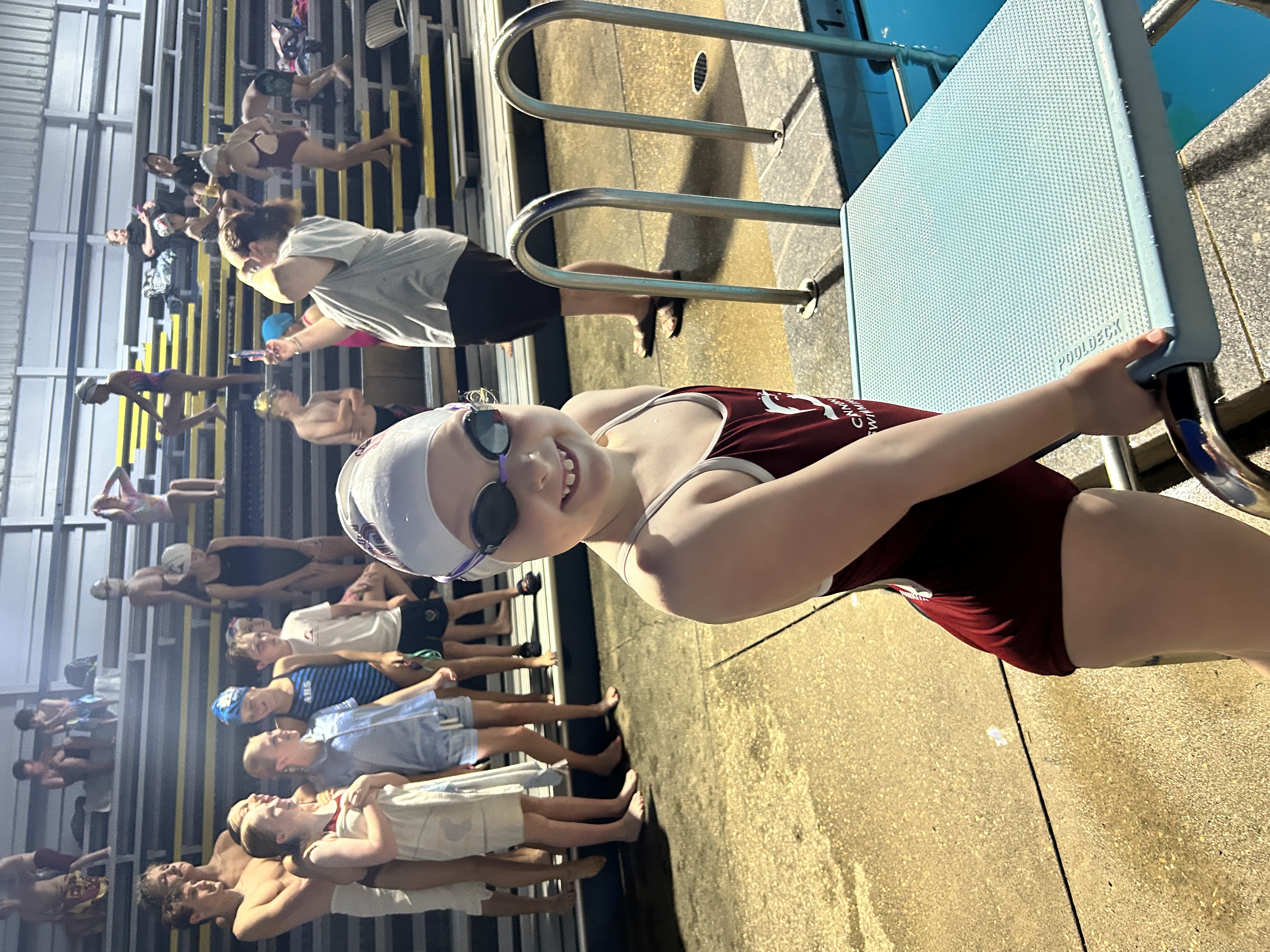 Swimmers lined up and ready to race
